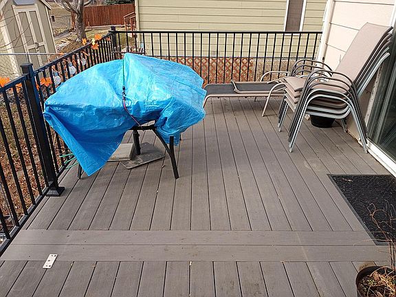New back deck with access from the dining room. Trex surface - no painting or splinters!