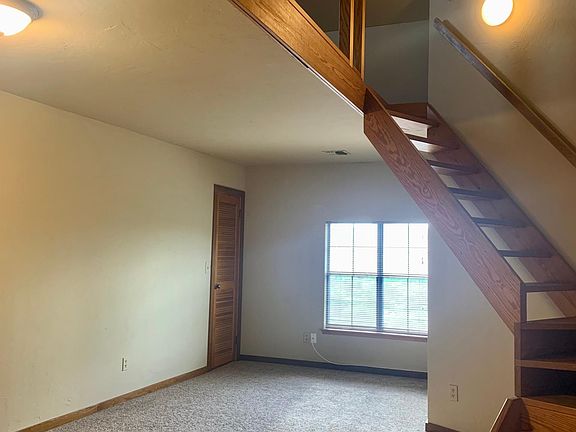 living, closet, stairs to loft