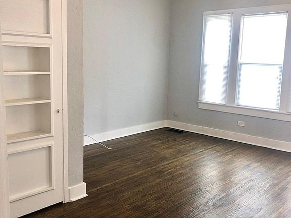 Living Room & Bookshelf Door to Closet - Bonus Storage!
