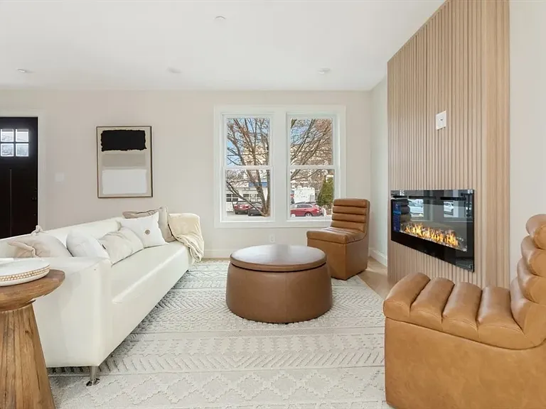 Welcome home: The open-concept layout immediately greets you with a sense of modern elegance and abundant natural light.