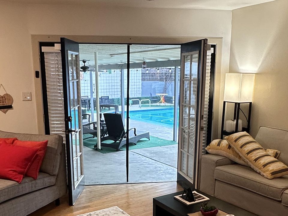 French doors leading to outdoor pool