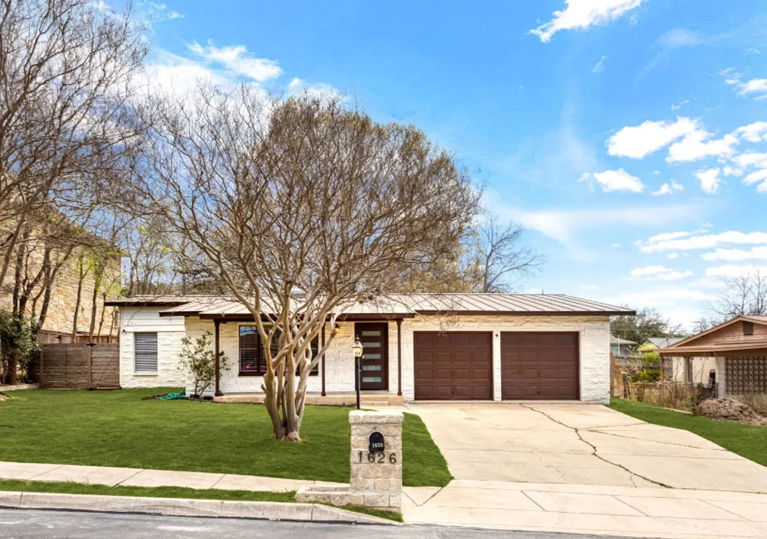Charming 3-Bedroom Home with Sunroom and Spacious Backyard — Photo 2