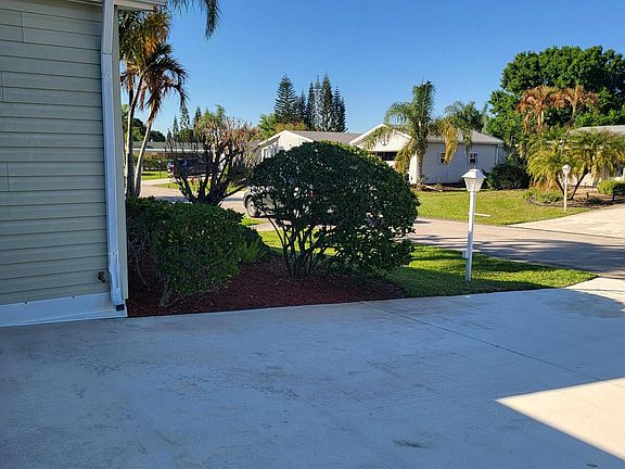 2nd image of 8125 9th Hole Drive