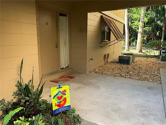 2nd image of 120 Hibiscus Woods Ct APT 14A
