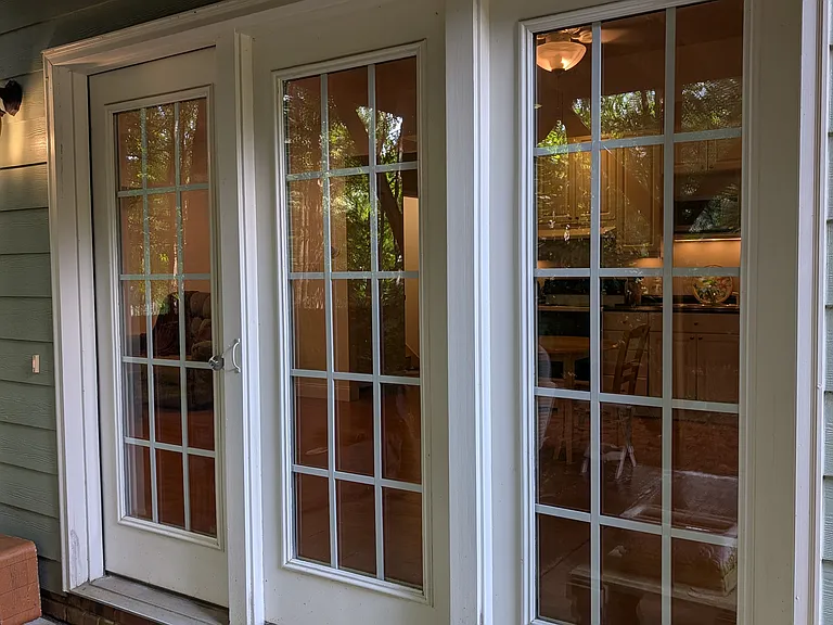 Looking from the patio into the French doors and access to the rental