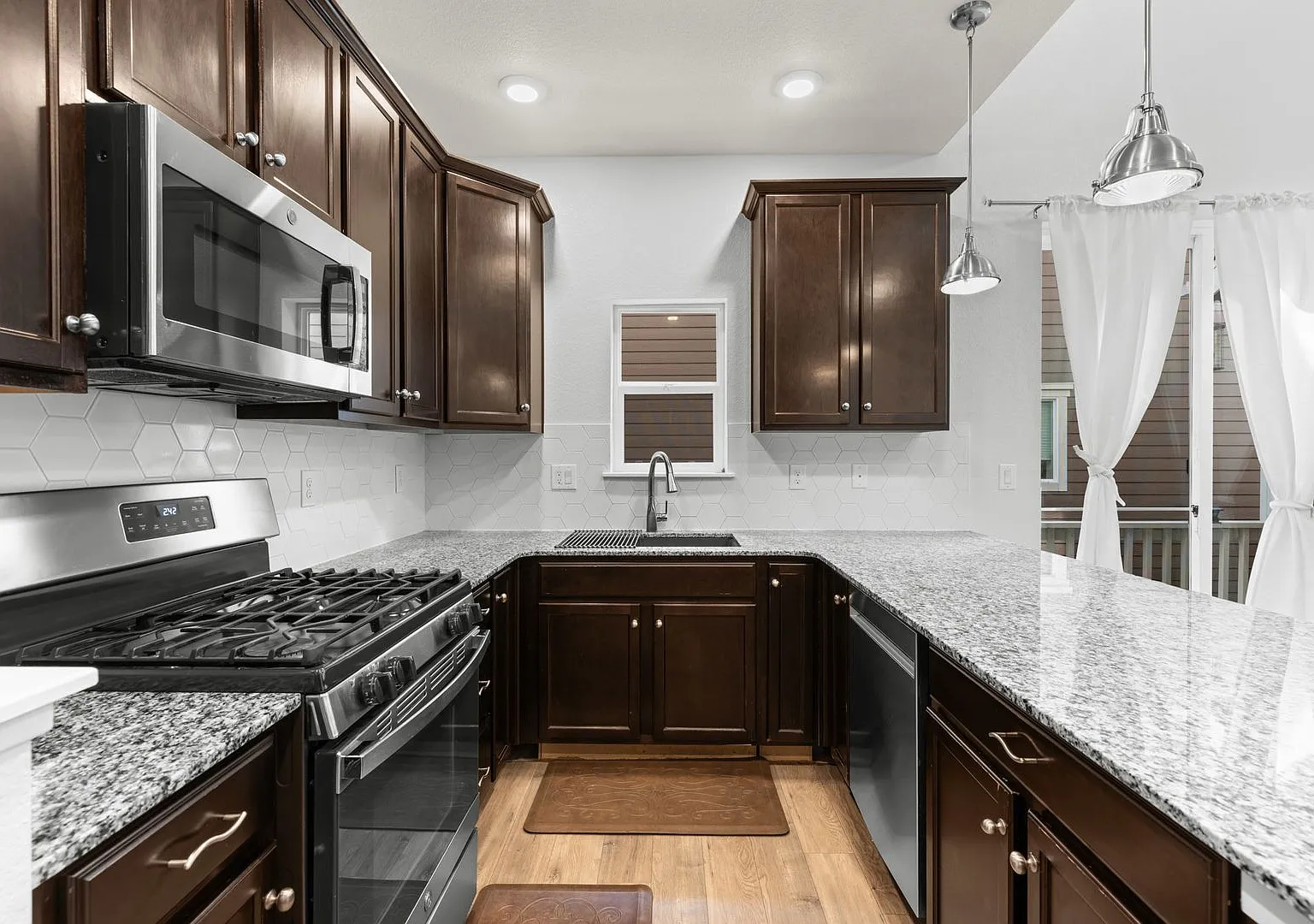 Light-Filled 4-Bd/4.5-Bath Townhome in Desirable Englewood! Available NOW! — Photo 1