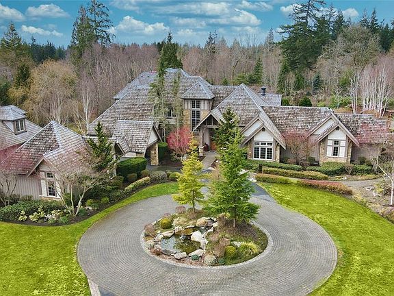 Exquisitely designed 8090 square feet home situated on over 4 acres of perfectly manicured grounds.
