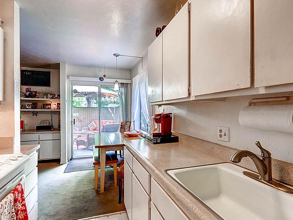 Dishwasher, open wall to living room