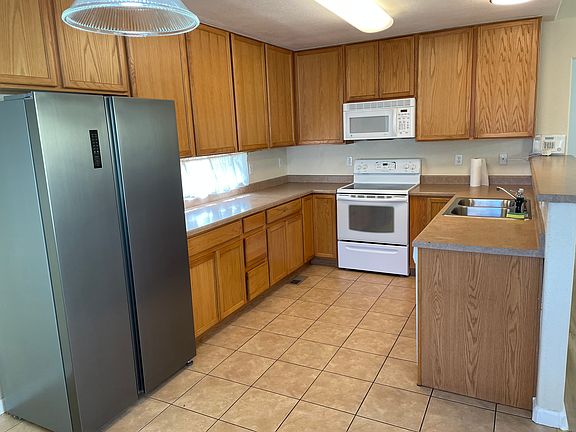 Efficient Kitchen with lots of cupboard space open to family room