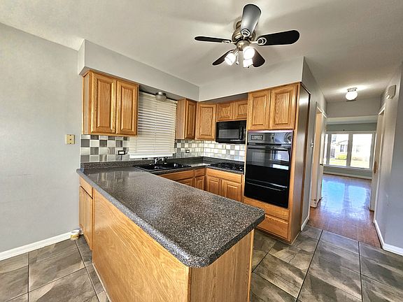 5th image of 6831 W 64th St
