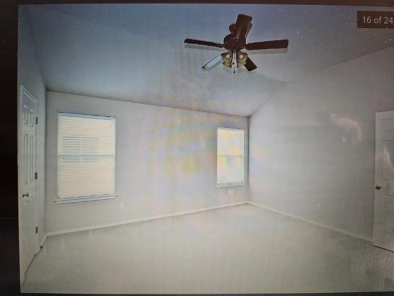 Large master with high ceilings.