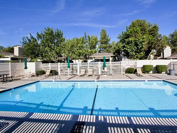 Amenities include swimming pool, spa and pool house.