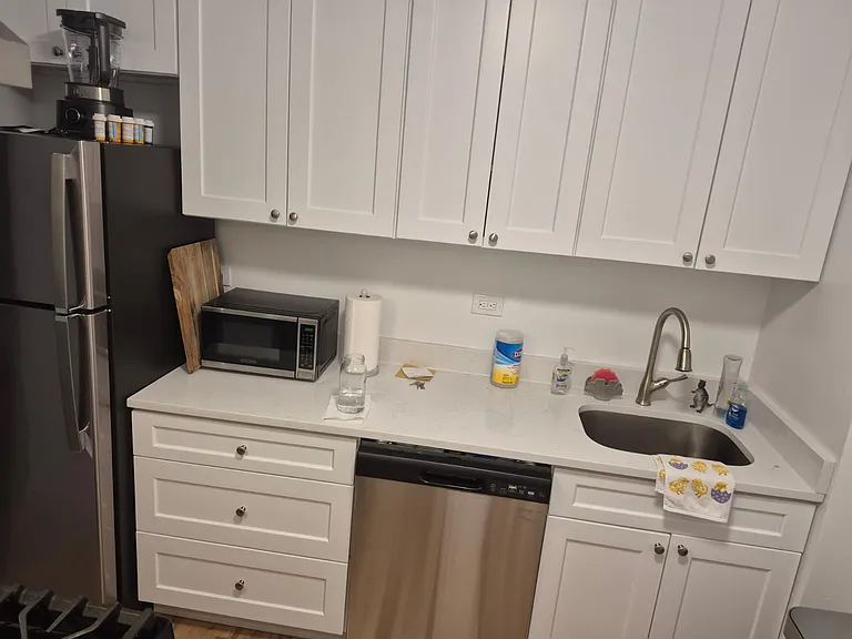 Kitchen -- large sink, new dishwasher, soft close cabinets