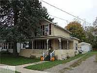1st image of 124 E 1st St