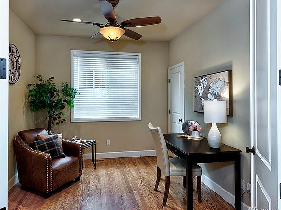 The den is near the dining room. It has a closet and could be used as a main floor guest room.