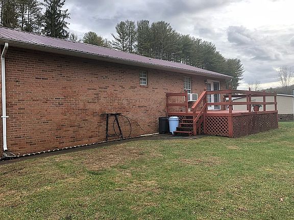 Rear sidewalk and Patio/Deck