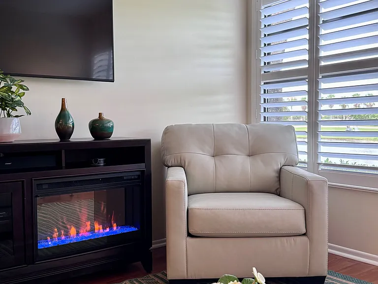 Cozy on up into this lovely 1st floor furnished 1bed/1bath condo w/ an electric fireplace!