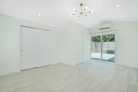 Primary Bedroom with wall-to-wall closet