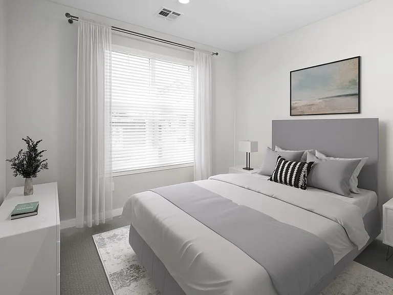 Bedroom with carpet
