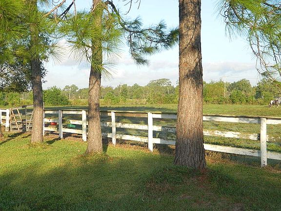 Fenced and lots of shade trees.