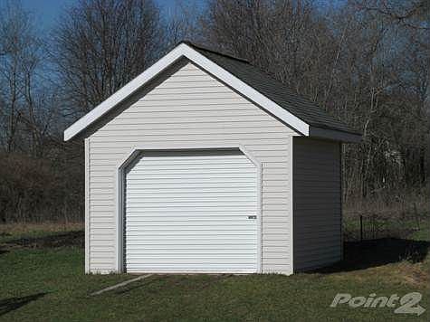 Matching storage building.