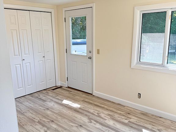 Home Entryway looking from Kitchen: new flooring and paint