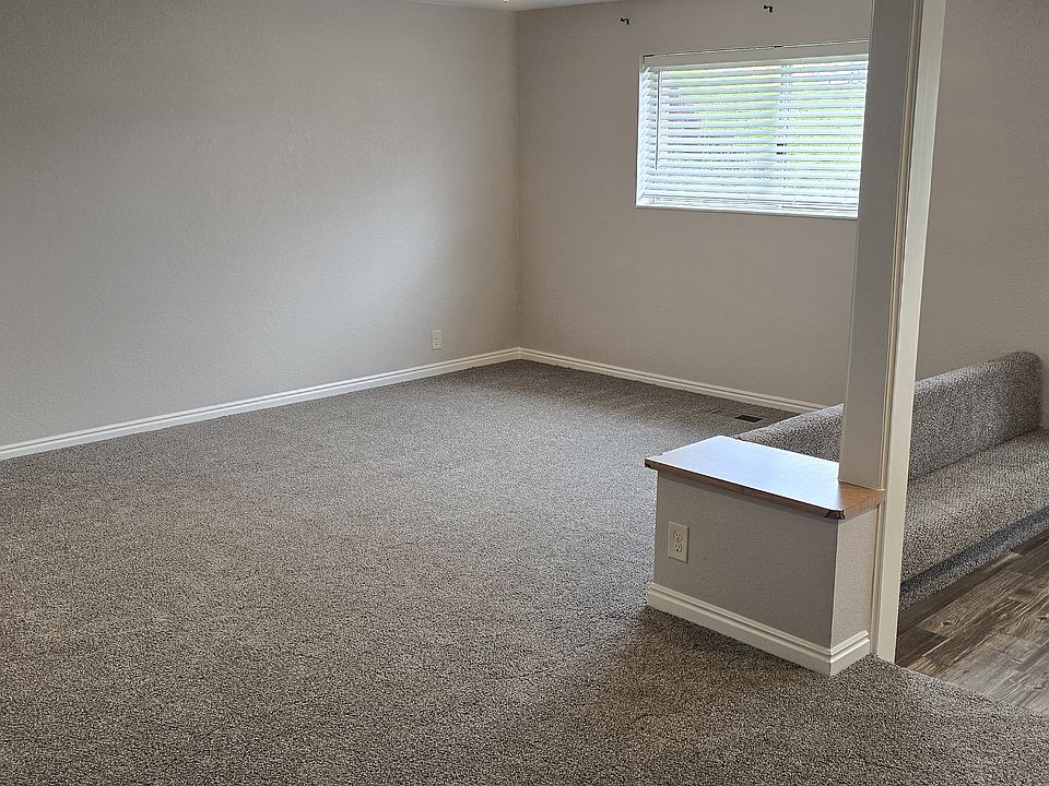 Spacious and well-lit living room area