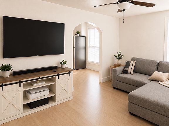 Living room looking into kitchen/dining