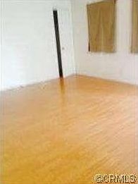 Living area, vinyl laminate flooring.