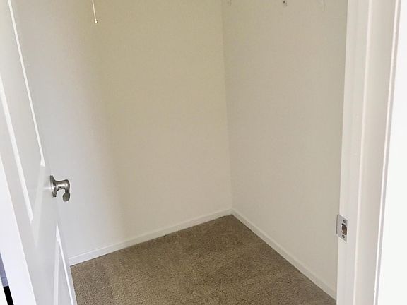 Master bed walk in closet 