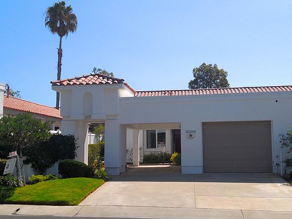 Mediterranean village - white stucco exteriors and red tile 
