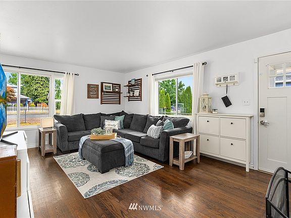Rich, dark finish on hardwoods throughout most of home.