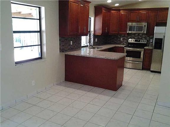 5th image of 9620 NW 42nd Ct