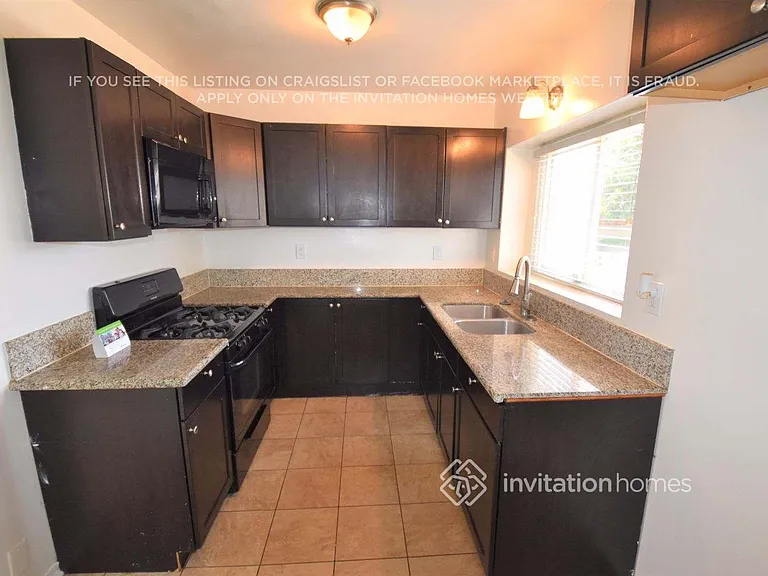 8947 S Denker Ave — Photo 4