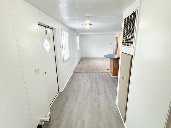 Hallway and Laundry Area-new flooring and freshly painted