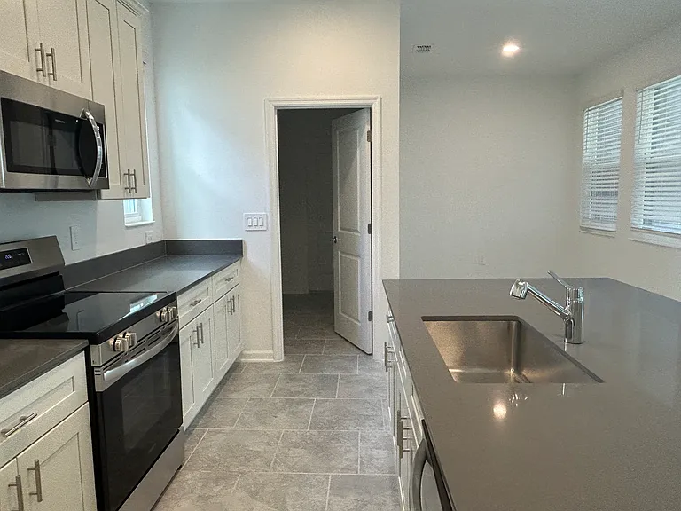 Access to laundry room from kitchen