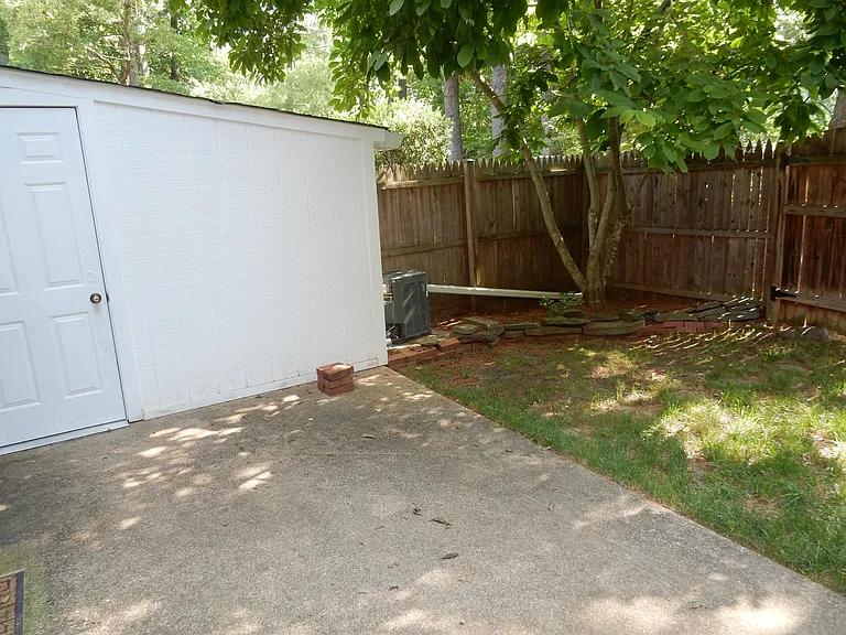backyard with patio--space for your table and chairs!