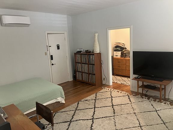 the unit comes with hardwood floors and an energy efficient mini-split for heating and AC