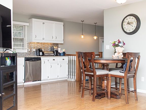 Open concept living, dining, and kitchen.