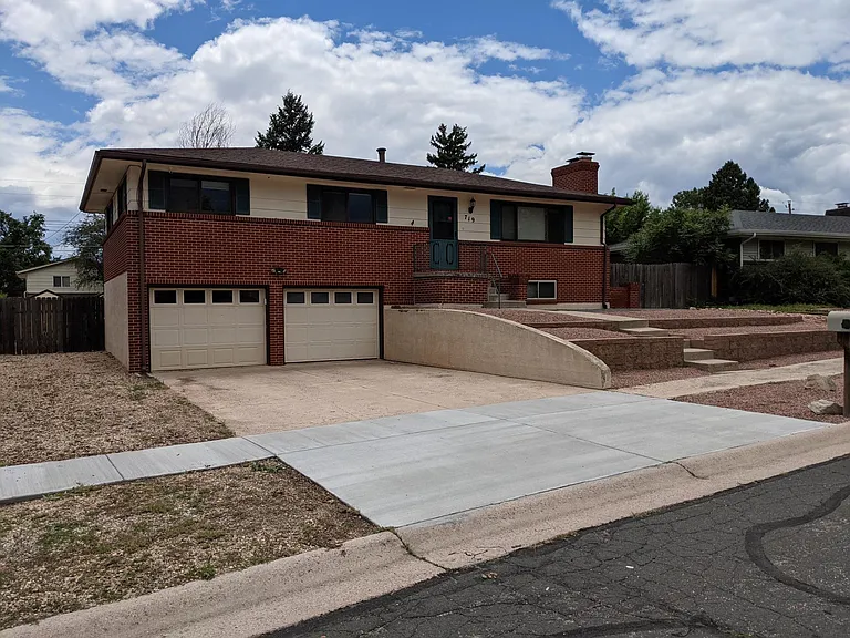 Lots of Parking with large two car garage with RV parking on side