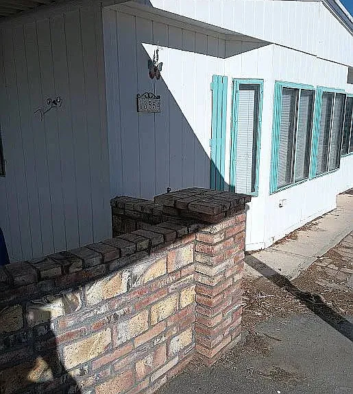 VIEW LOOKING FROM LEFT SIDE FRONT. NOTICE THE WORKMANSHIP OF THE MEXICAN LADRIO BRICK WORK FOR YOUR PRIVACY AND COMFORT
