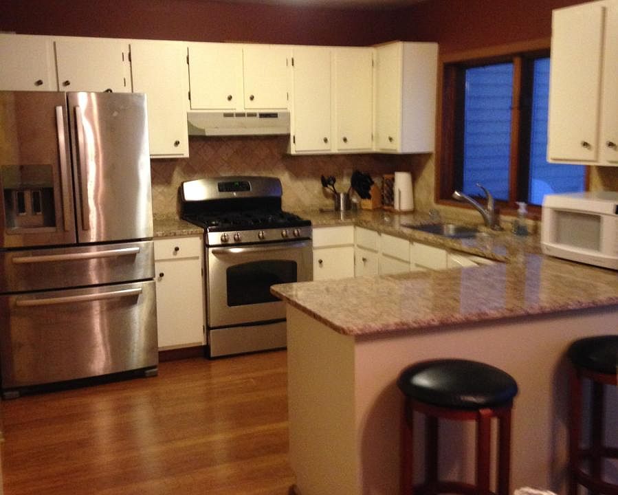 Kitchen with granite counters and stainless appliances