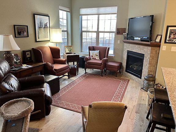 Living Room - Lots of Windows and Fireplace