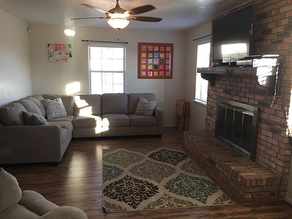 Living rm w/ wood burning FP