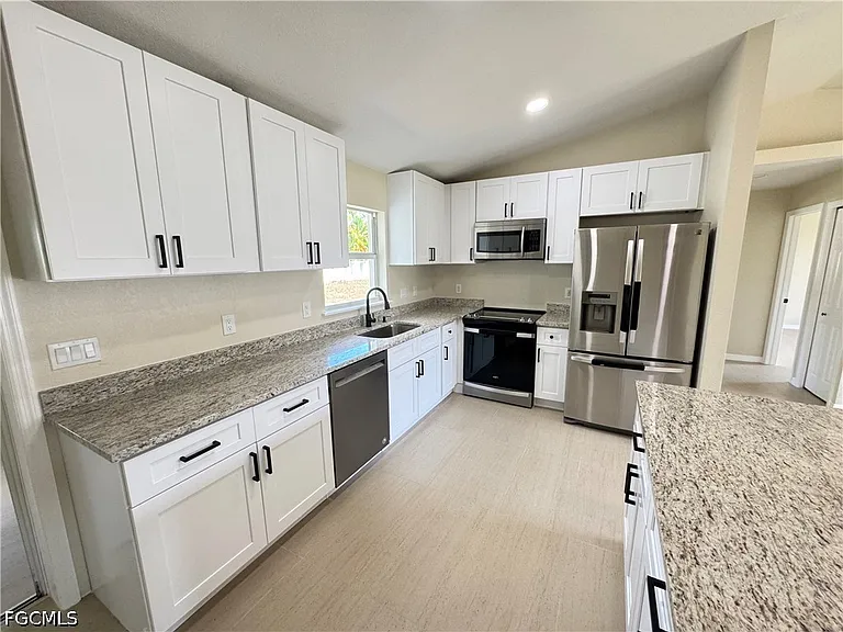 4426 SW Santa Barbara Pl — Photo 33