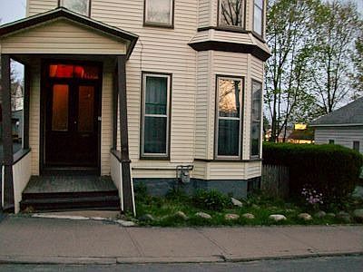 The front entryway and small flower bed