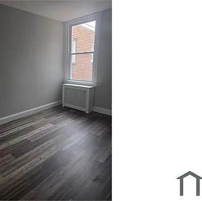 6957 Ogontz Ave — Photo 2
