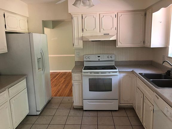 Kitchen view 1 with dining room behind