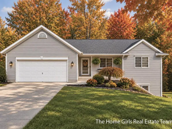 10333 Meadowgate Dr NE, Sparta, MI 49345