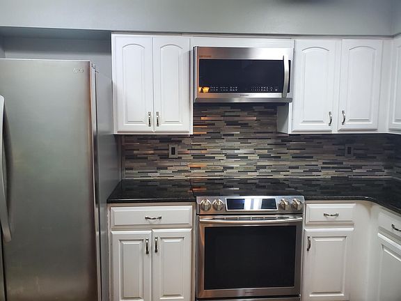4th image of 8940 Village Green Blvd
